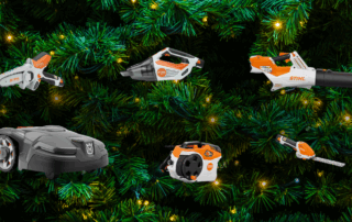 On a backdrop of a lit Christmas tree, surrounded by STIHL and Husqvarna power equipment that is mentioned in the blog