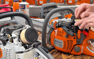 Image of two chainsaws and